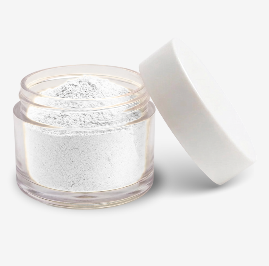 A clear round jar filled with white food colouring powder, shown open with a white lid leaning against it on a clean white background.