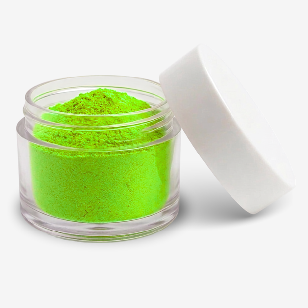 A small clear plastic jar filled with yellow-green powder, shown with its white screw-top lid leaning against it on a clean white background.